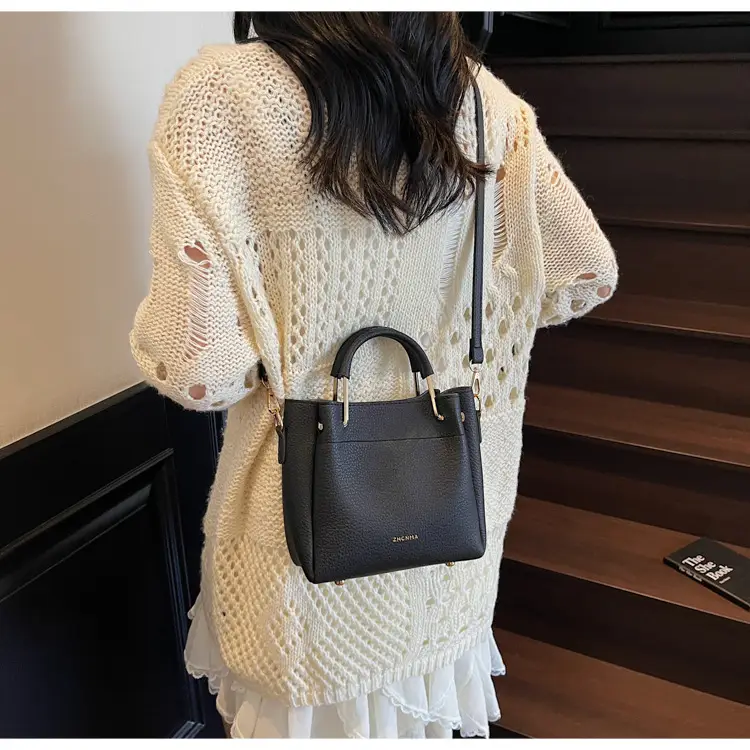 Women Retro Brown Bucket Bag Large Capacity Commuter Crossbody luggage and leather goods — feature 13
