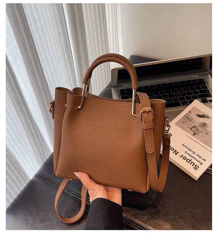 Women Retro Brown Bucket Bag Large Capacity Commuter Crossbody luggage and leather goods — feature 3