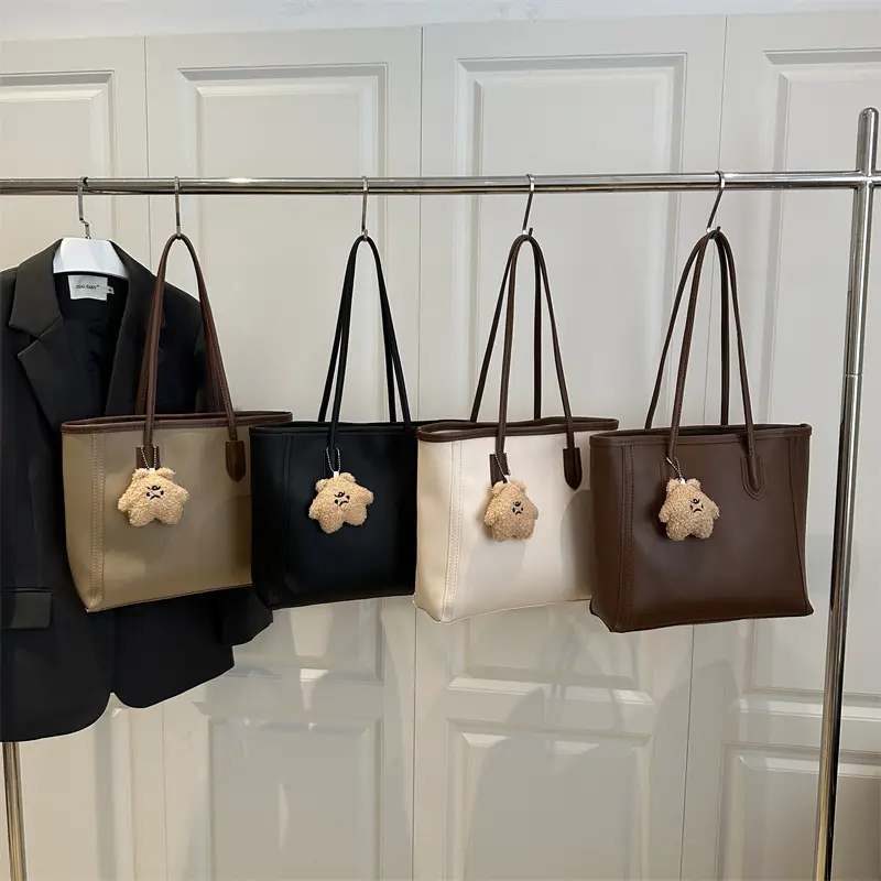 White Leather Shoulder Bag with Brown Strap & Pom Pom Charm - Image 10