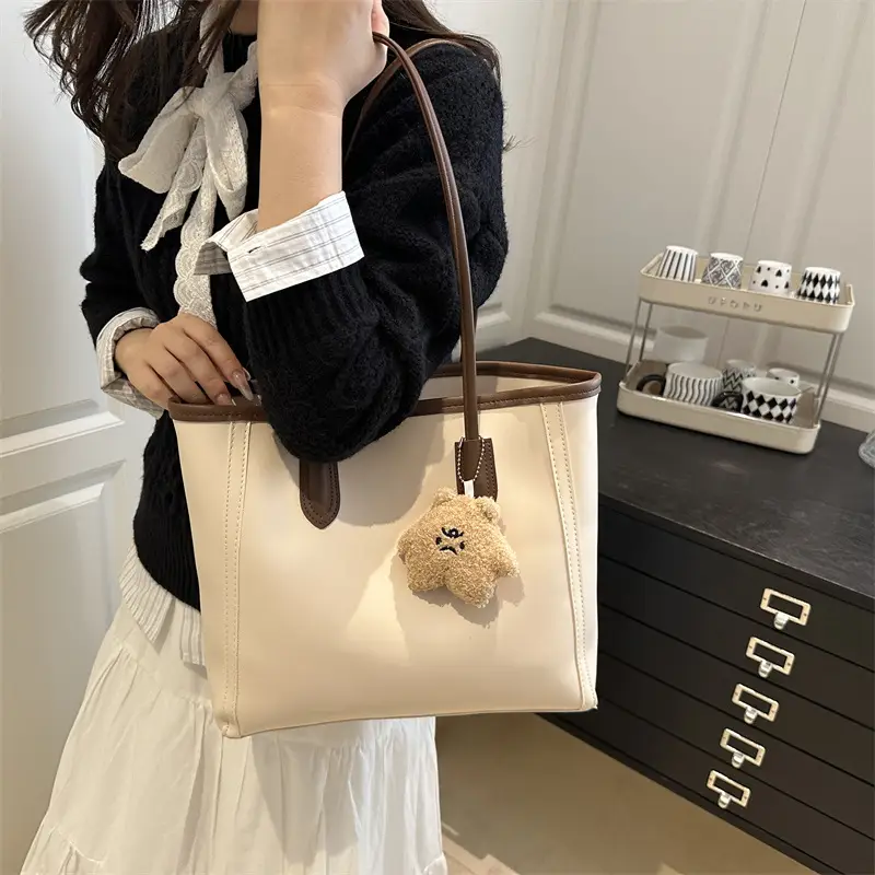 White Leather Shoulder Bag with Brown Strap & Pom Pom Charm - Image 11