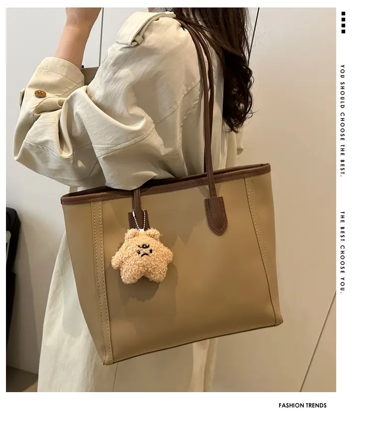 White Leather Shoulder Bag with Brown Strap & Pom Pom Charm — feature 1