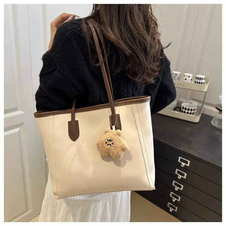 White Leather Shoulder Bag with Brown Strap & Pom Pom Charm — feature 10