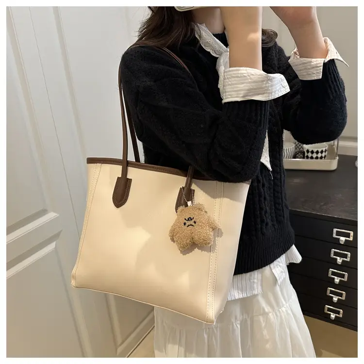 White Leather Shoulder Bag with Brown Strap & Pom Pom Charm — feature 12