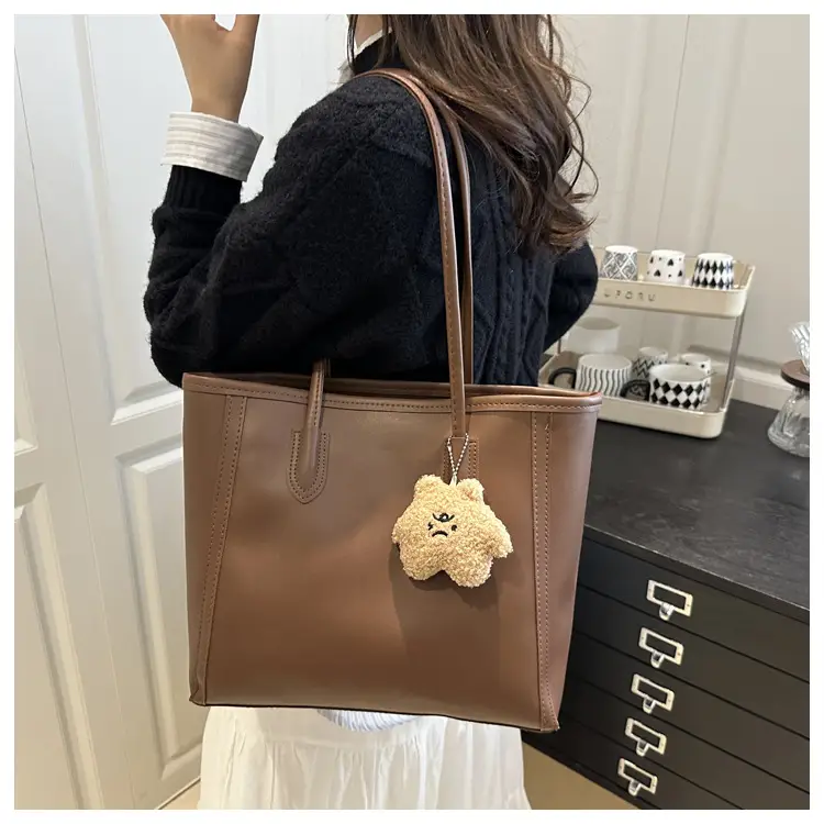 White Leather Shoulder Bag with Brown Strap & Pom Pom Charm — feature 15