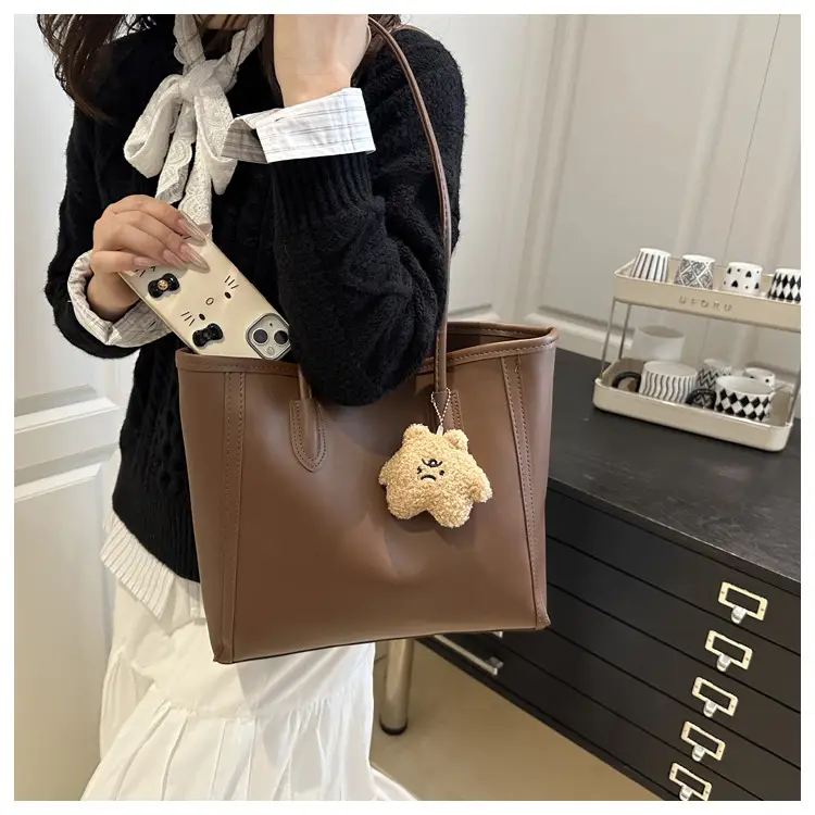 White Leather Shoulder Bag with Brown Strap & Pom Pom Charm — feature 16
