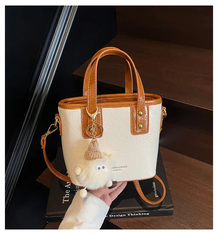 Women Retro Brown Leather Bucket Bag with Bear Charm — feature 1