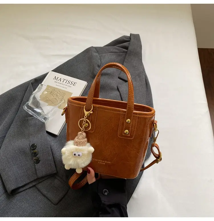 Women Retro Brown Leather Bucket Bag with Bear Charm - Image 3