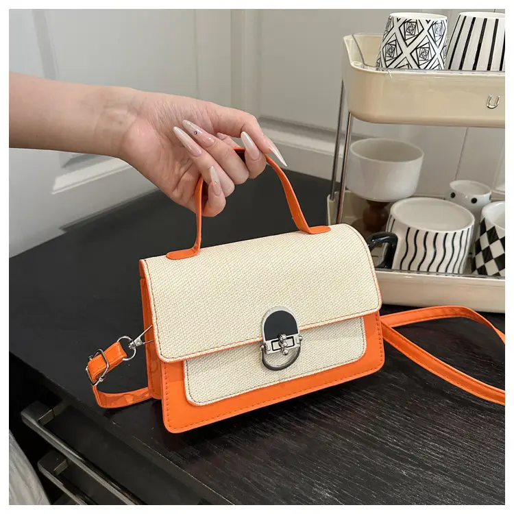 Black Embroidered Women's Crossbody Bag with Gold Clasp — feature 11