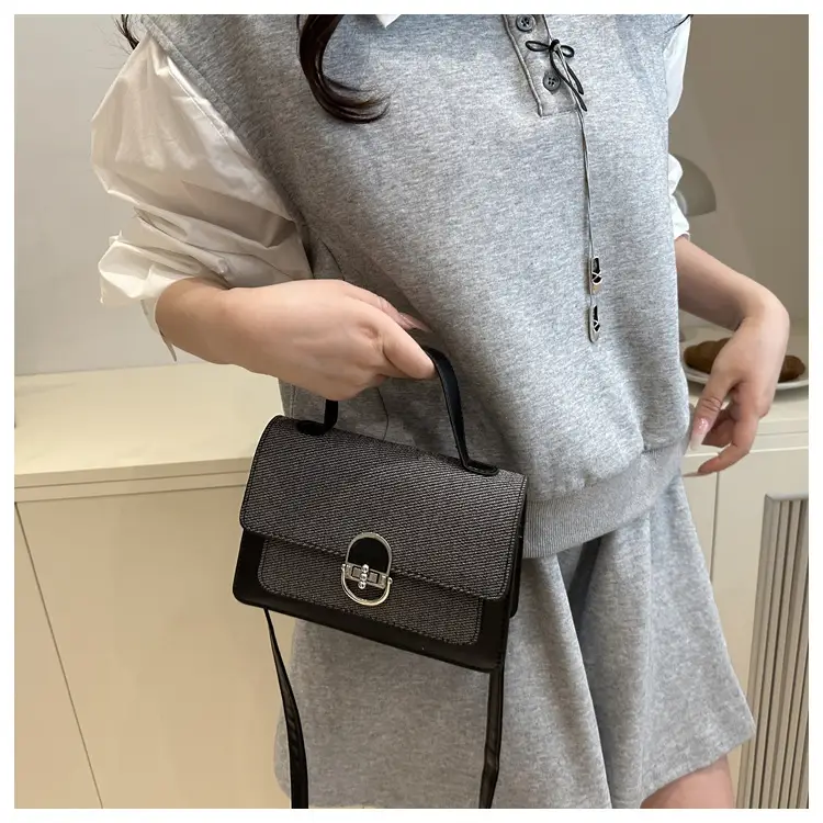 Black Embroidered Women's Crossbody Bag with Gold Clasp — feature 21