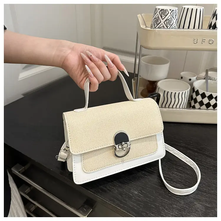 Black Embroidered Women's Crossbody Bag with Gold Clasp — feature 8