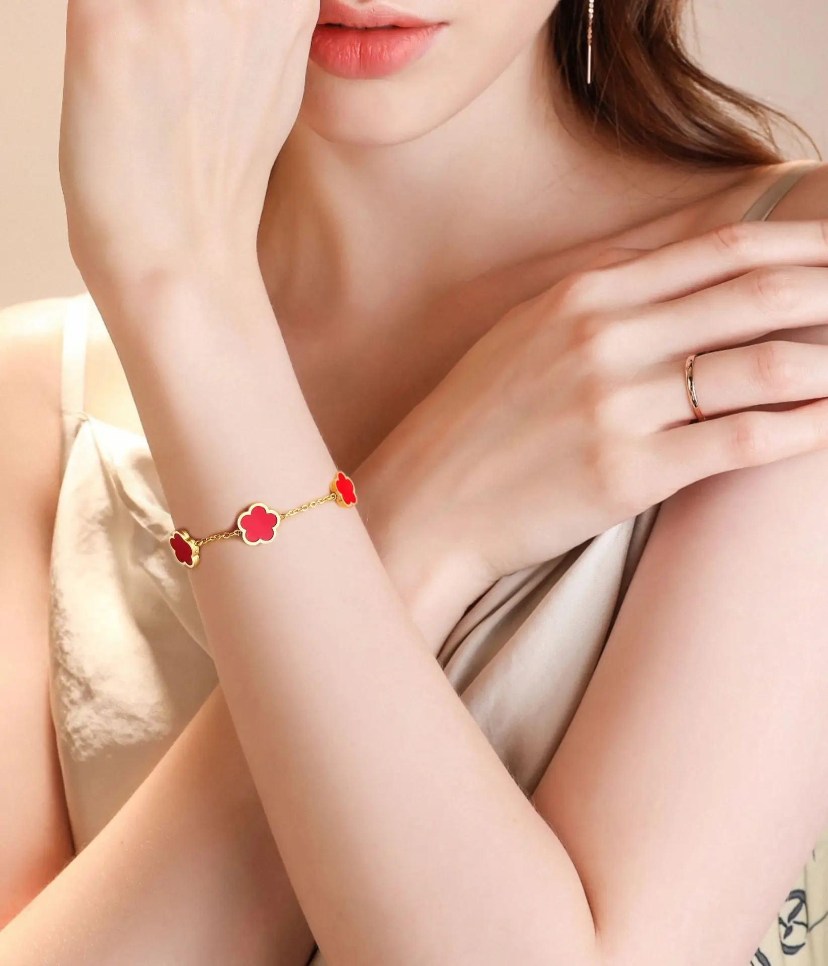 Women's Five-Leaf Clover Titanium Steel Bracelet with Plum Blossom Pendant — feature 2