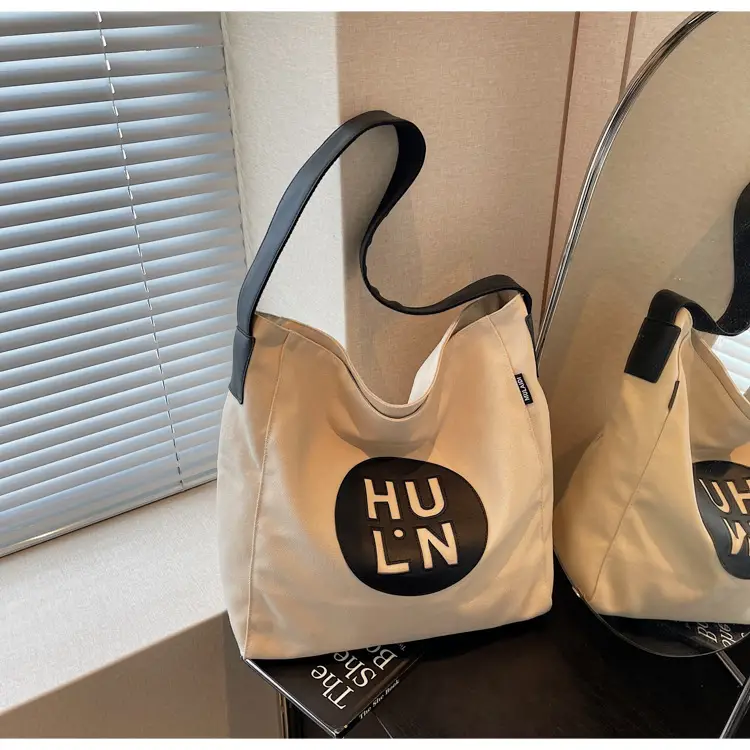 Women's Canvas Crossbody Bag with Logo 2026 — feature 13