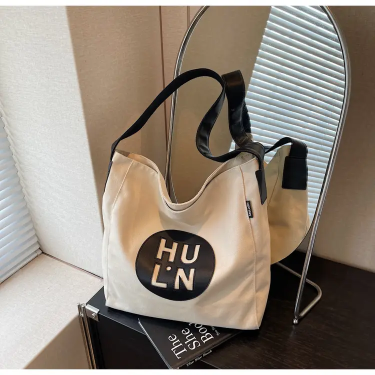 Women's Canvas Crossbody Bag with Logo 2026 — feature 14