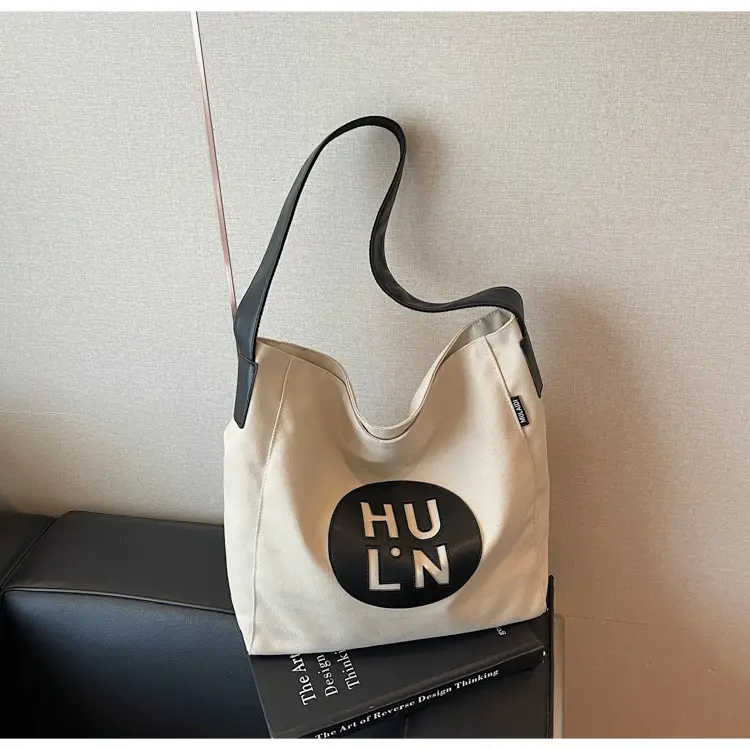 Women's Canvas Crossbody Bag with Logo 2026 — feature 15