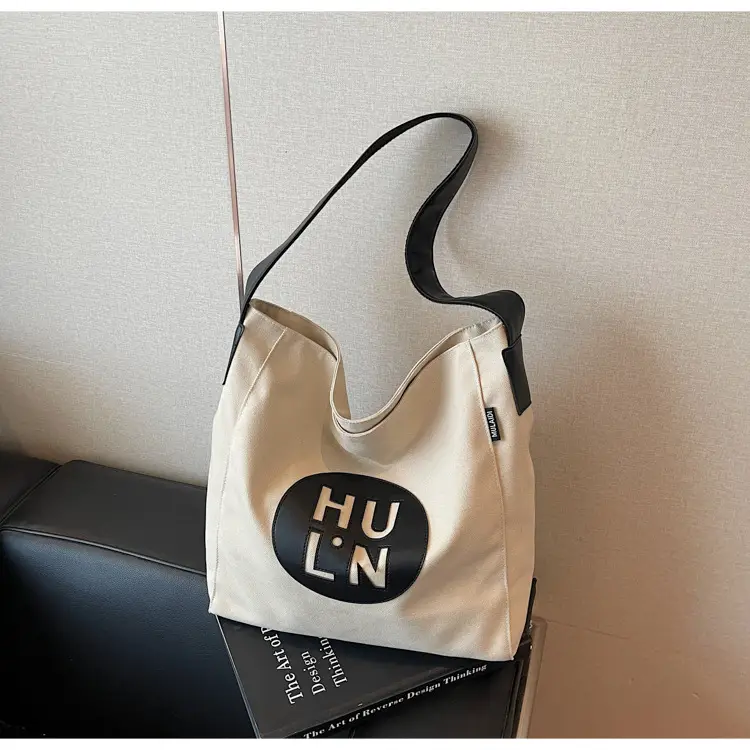 Women's Canvas Crossbody Bag with Logo 2026 — feature 16