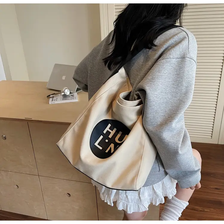 Women's Canvas Crossbody Bag with Logo 2026 — feature 22