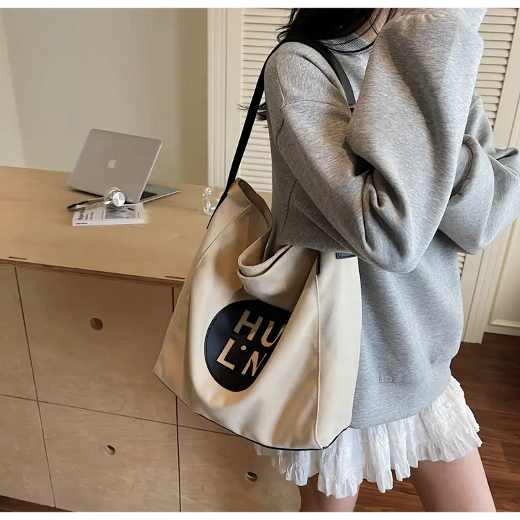Women's Canvas Crossbody Bag with Logo 2026 — feature 23