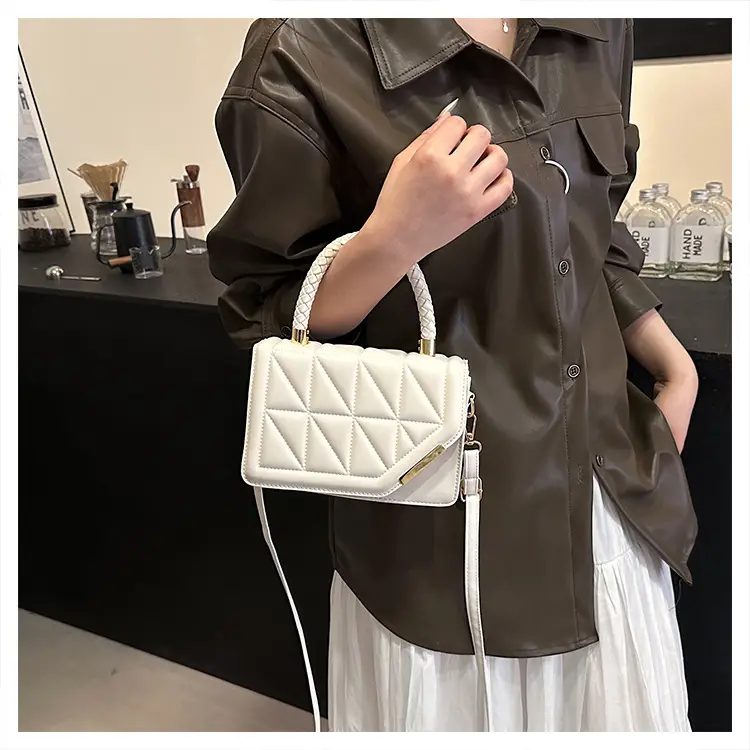 2025 Black Embossed Square Shoulder Bag with Gold Hardware — feature 36