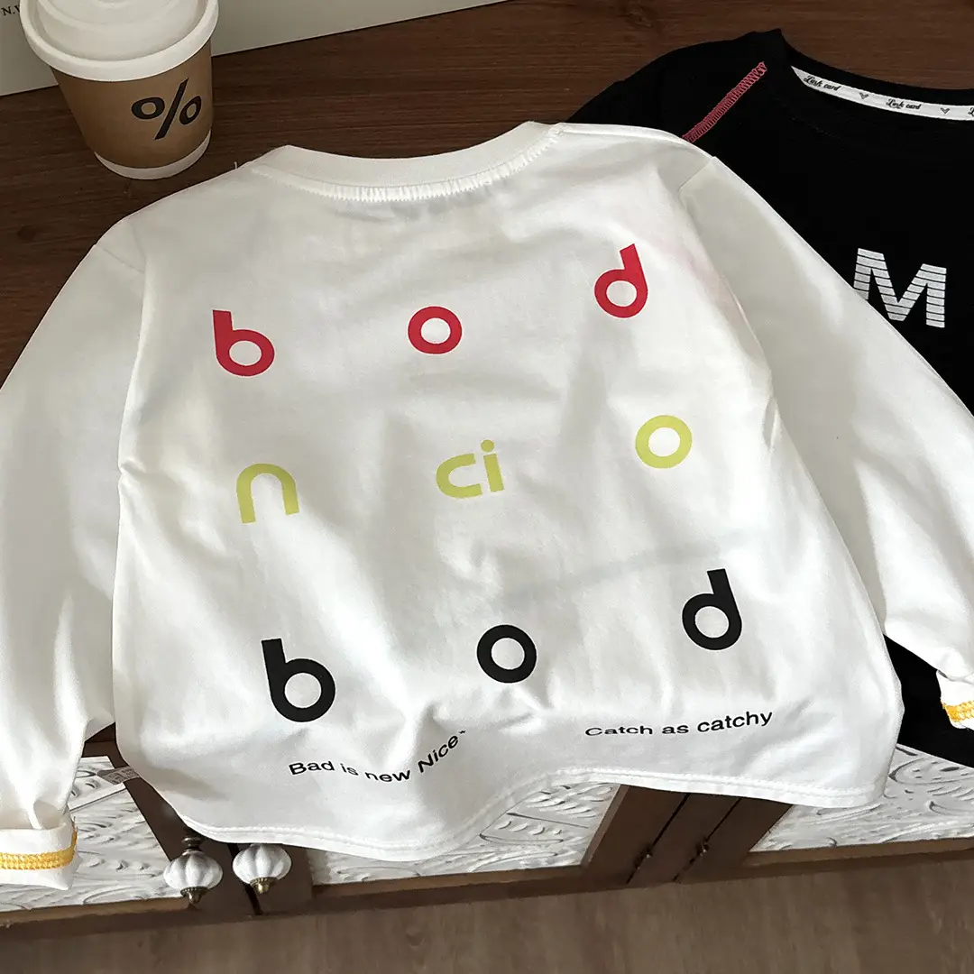 Children's Black Printed Long Sleeve Top with "Bad is New Now" Design — feature 11
