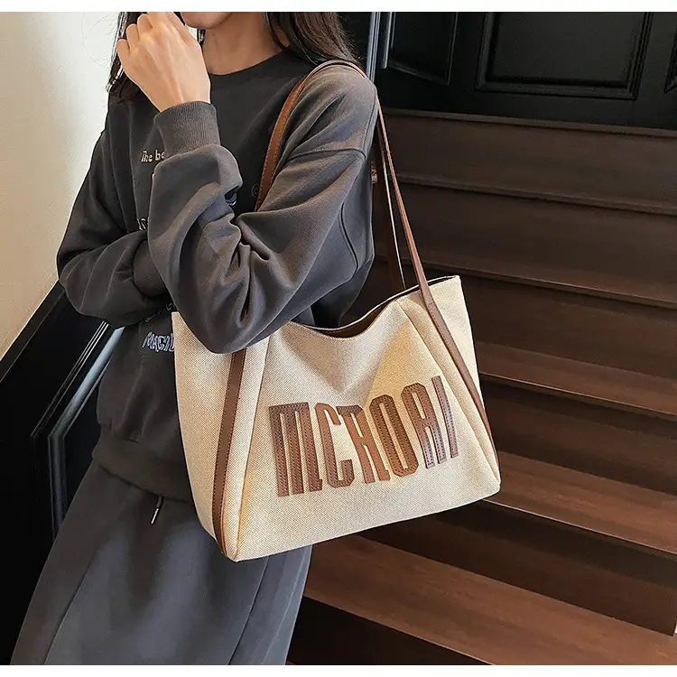 Women's Cross-Brand Canvas Tote Bag Large Capacity Fashionable Commuter Bag — feature 5