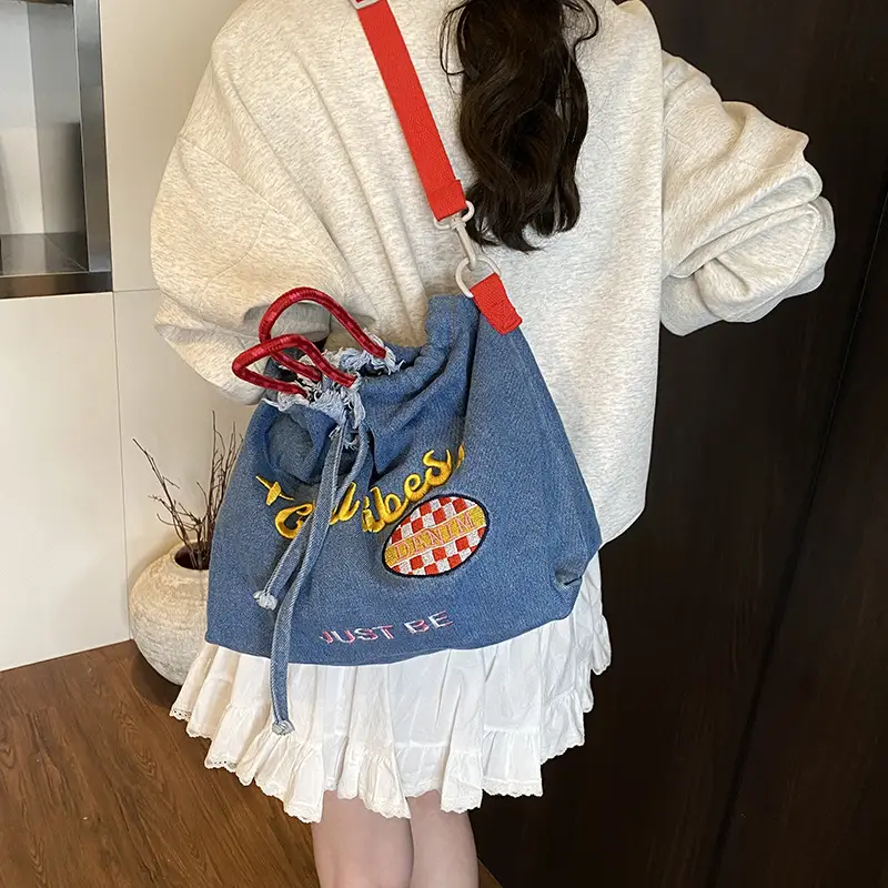 Blue Denim Shoulder Bag with "T Girl Robber" Design - Image 5