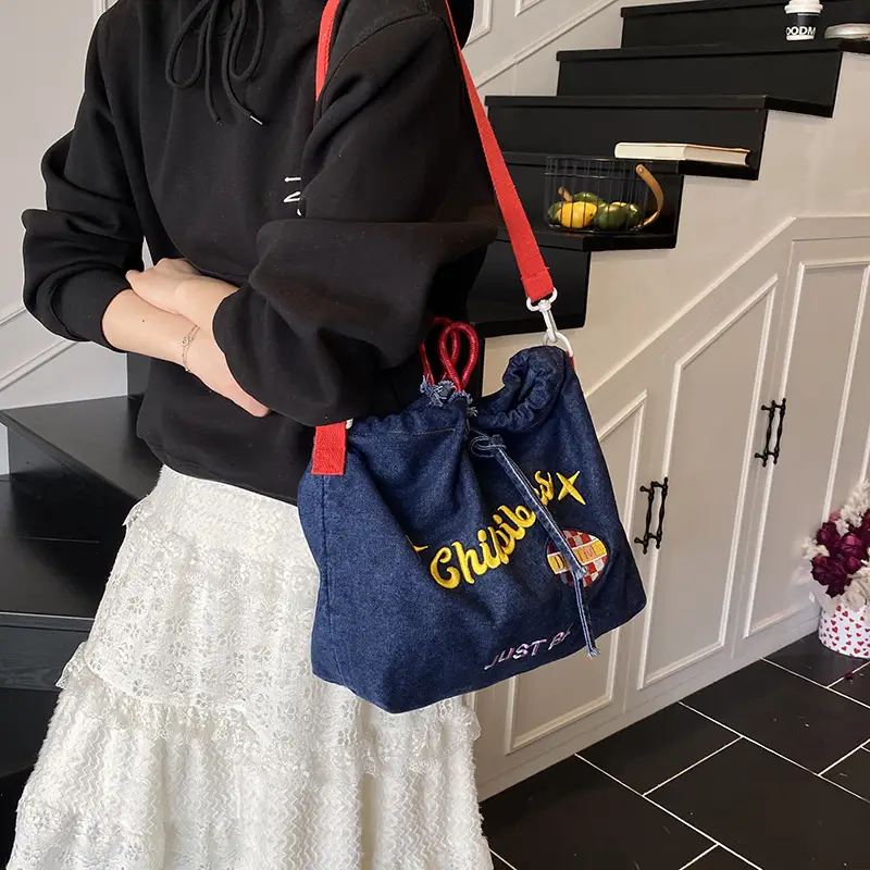 Blue Denim Shoulder Bag with "T Girl Robber" Design - Image 6
