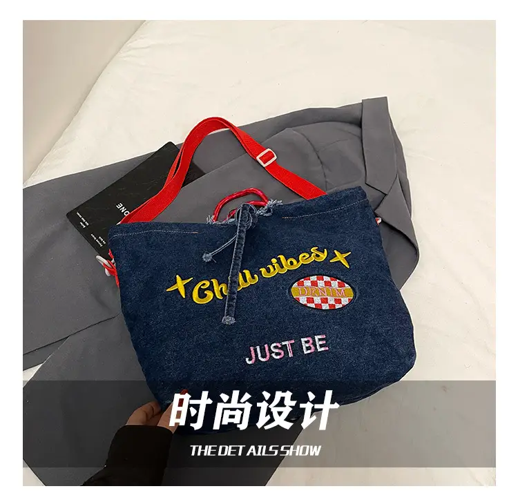 Blue Denim Shoulder Bag with "T Girl Robber" Design — feature 4