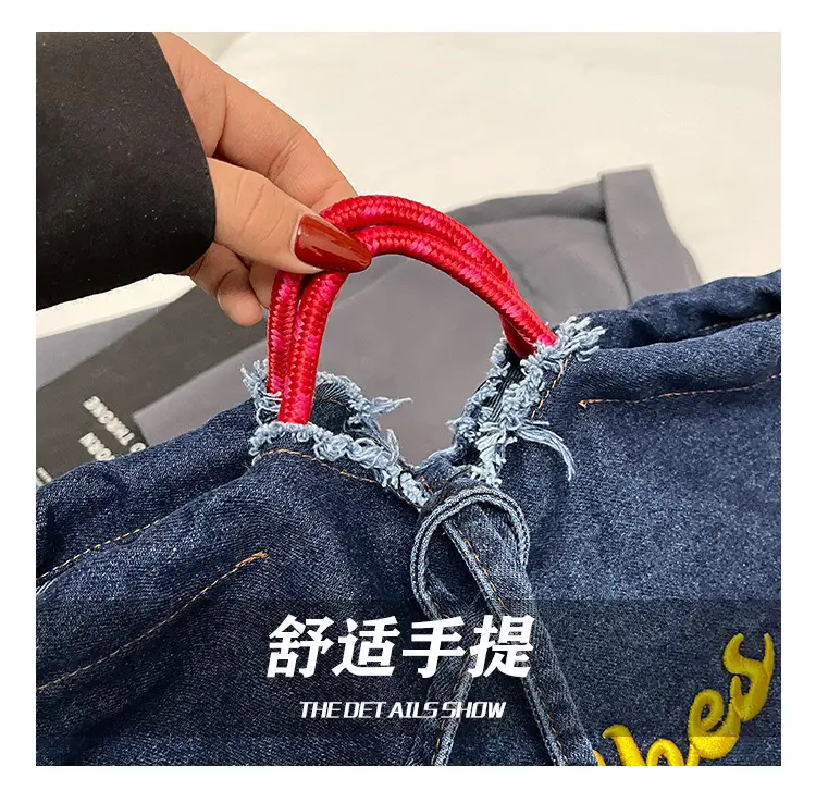 Blue Denim Shoulder Bag with "T Girl Robber" Design — feature 5