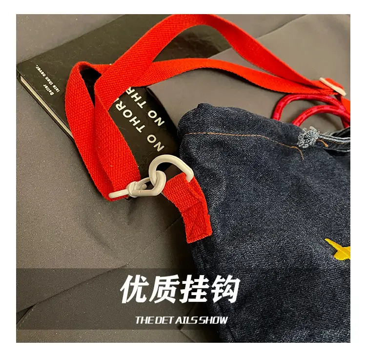 Blue Denim Shoulder Bag with "T Girl Robber" Design — feature 7