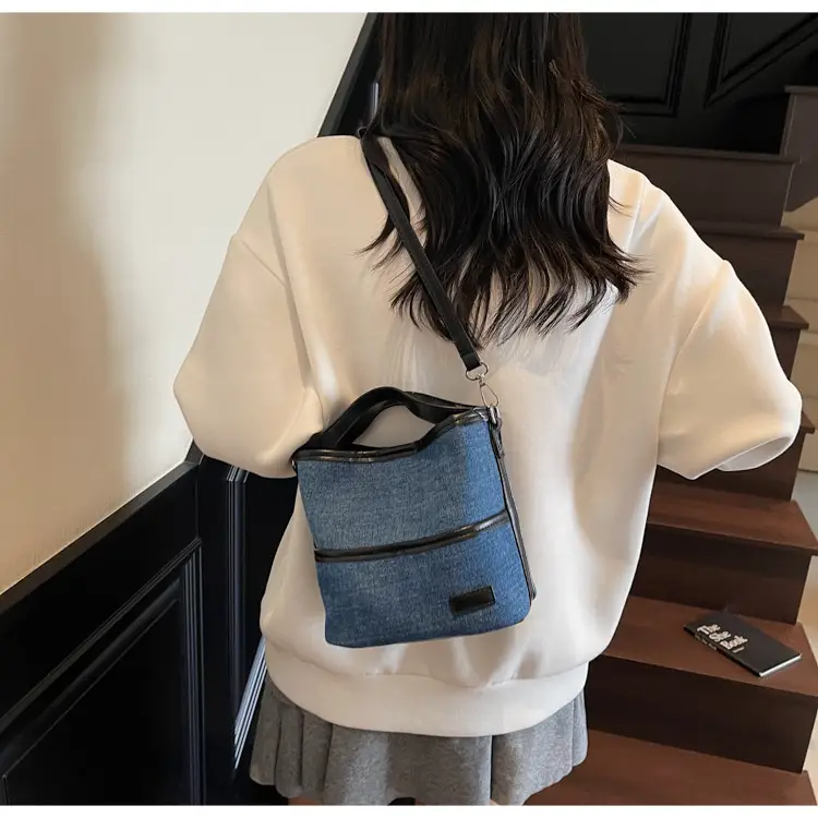 Blue Denim Crossbody Bag with Brown Leather Strap — feature 19
