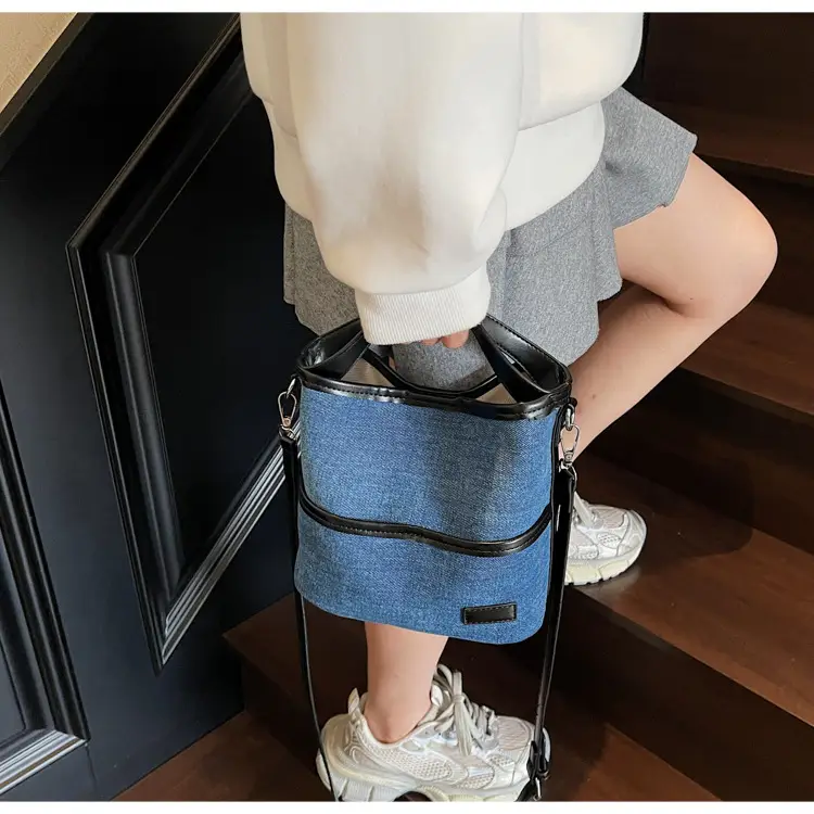 Blue Denim Crossbody Bag with Brown Leather Strap — feature 21
