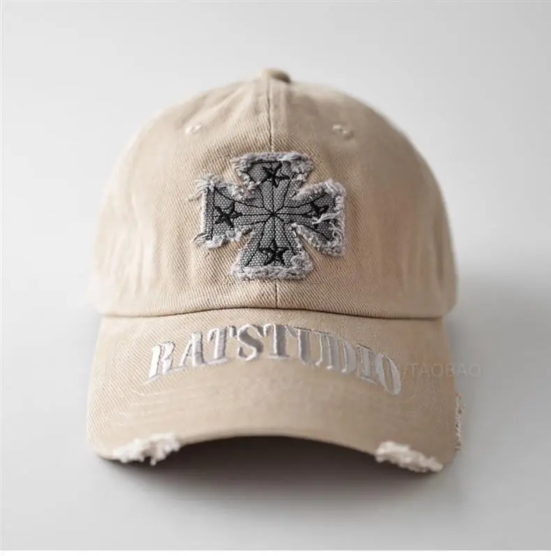 Black American Style Baseball Cap with Embroidered Cross Flower & "MASTUDIO" Text — feature 1