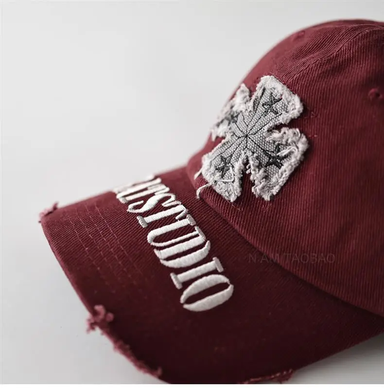 Black American Style Baseball Cap with Embroidered Cross Flower & "MASTUDIO" Text — feature 10