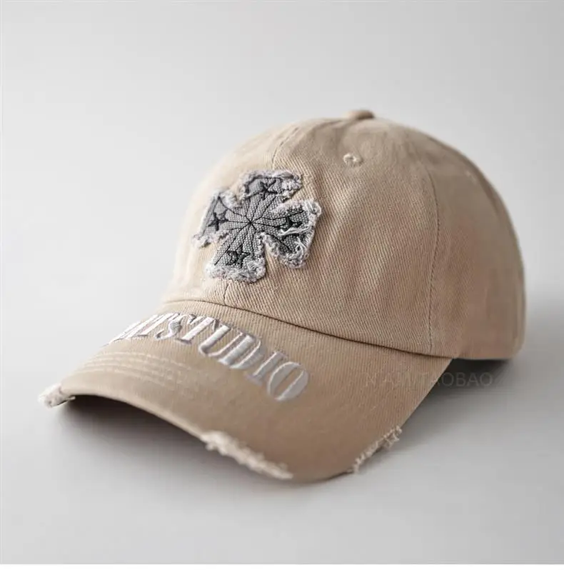 Black American Style Baseball Cap with Embroidered Cross Flower & "MASTUDIO" Text — feature 3