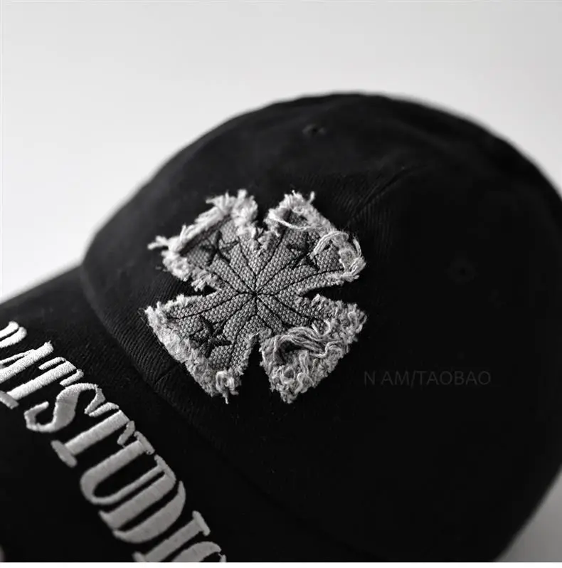 Black American Style Baseball Cap with Embroidered Cross Flower & "MASTUDIO" Text — feature 4