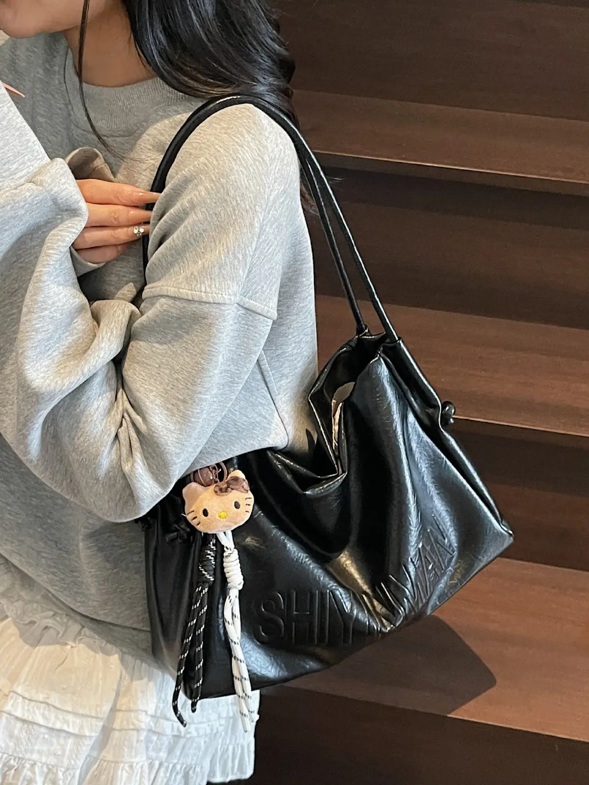 Stylish Brown Crossbody Bag with Cute Charm - Image 7