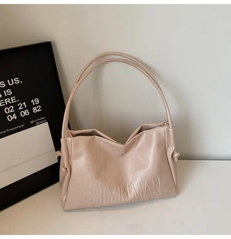 Stylish Brown Crossbody Bag with Cute Charm — feature 16