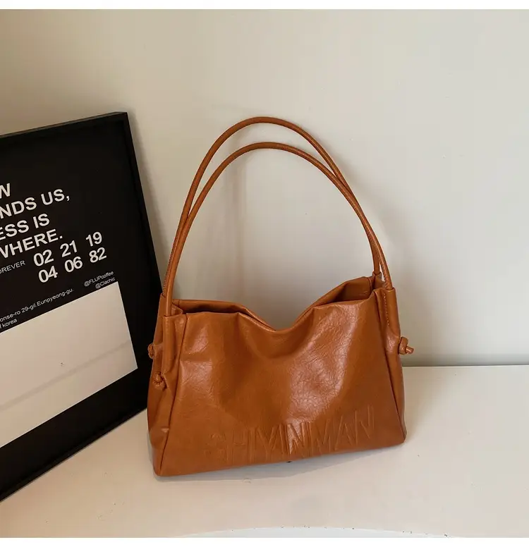 Stylish Brown Crossbody Bag with Cute Charm — feature 17