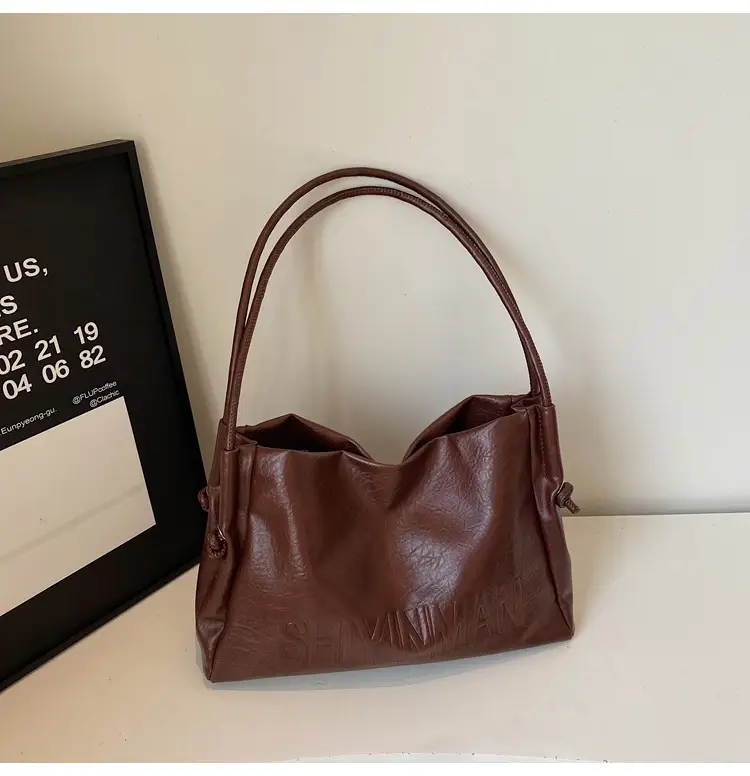Stylish Brown Crossbody Bag with Cute Charm — feature 18