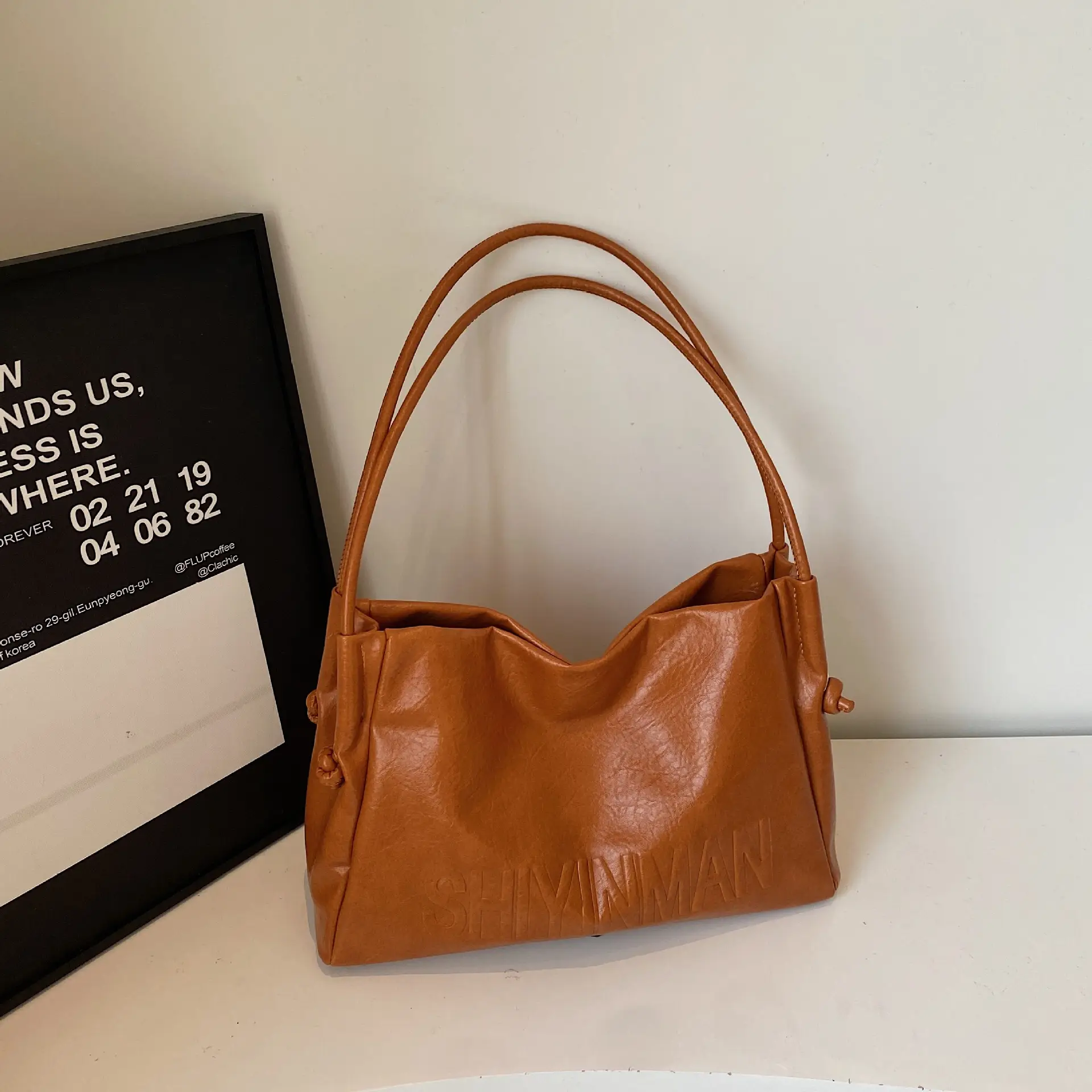Stylish Brown Crossbody Bag with Cute Charm - Image 2