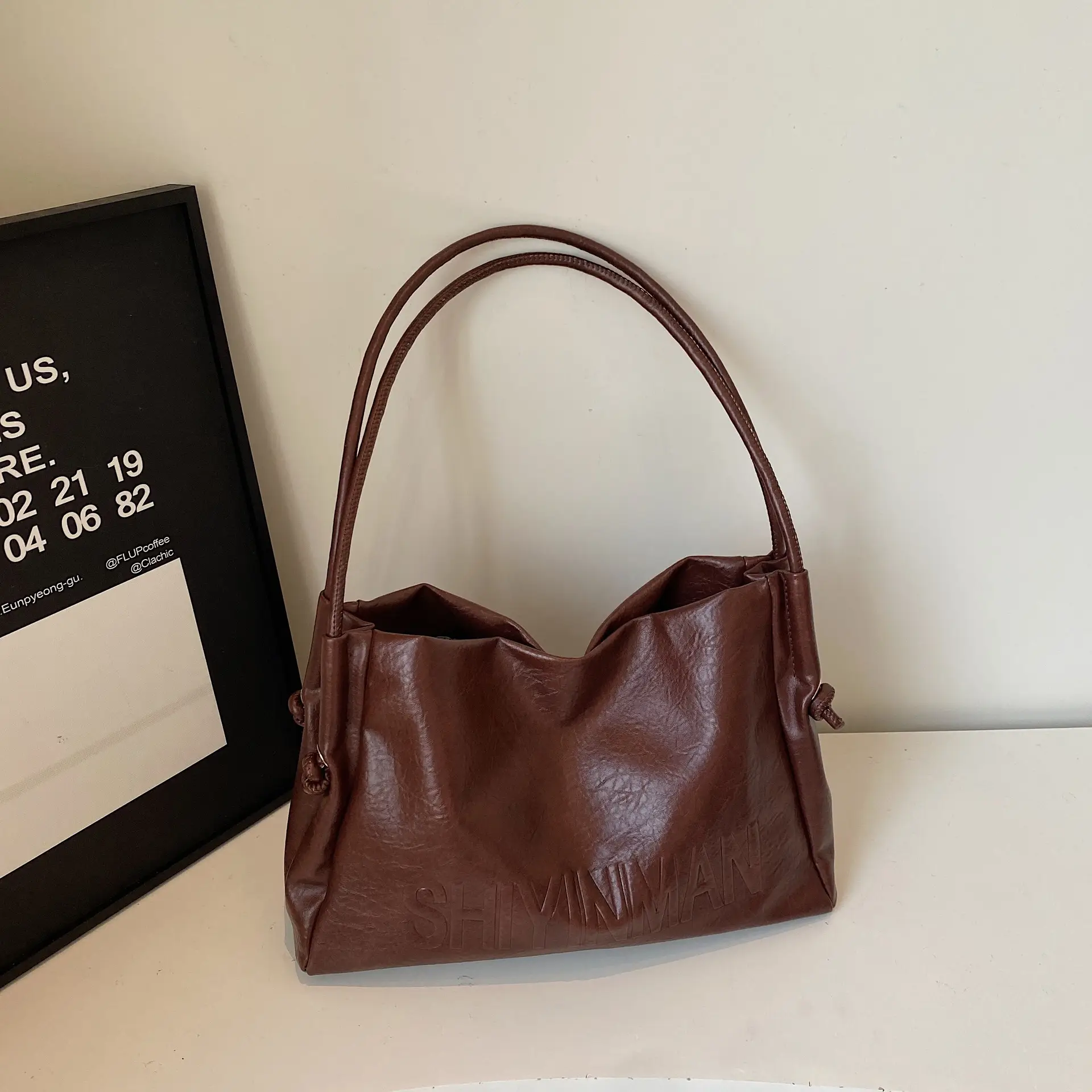 Stylish Brown Crossbody Bag with Cute Charm - Image 3