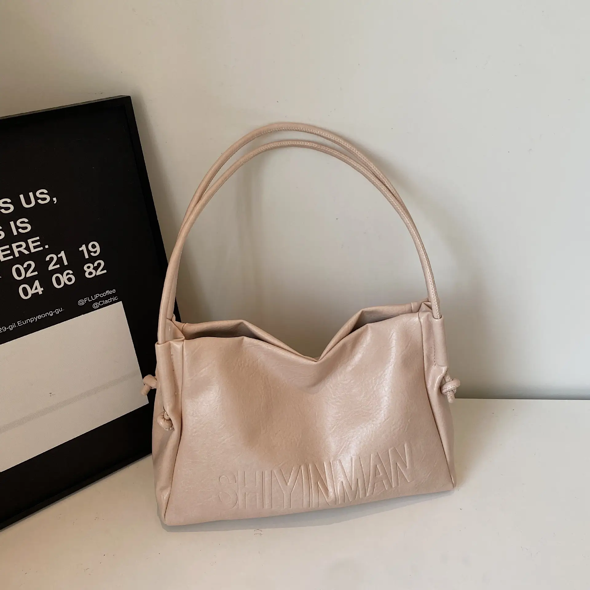 Stylish Brown Crossbody Bag with Cute Charm - Image 4