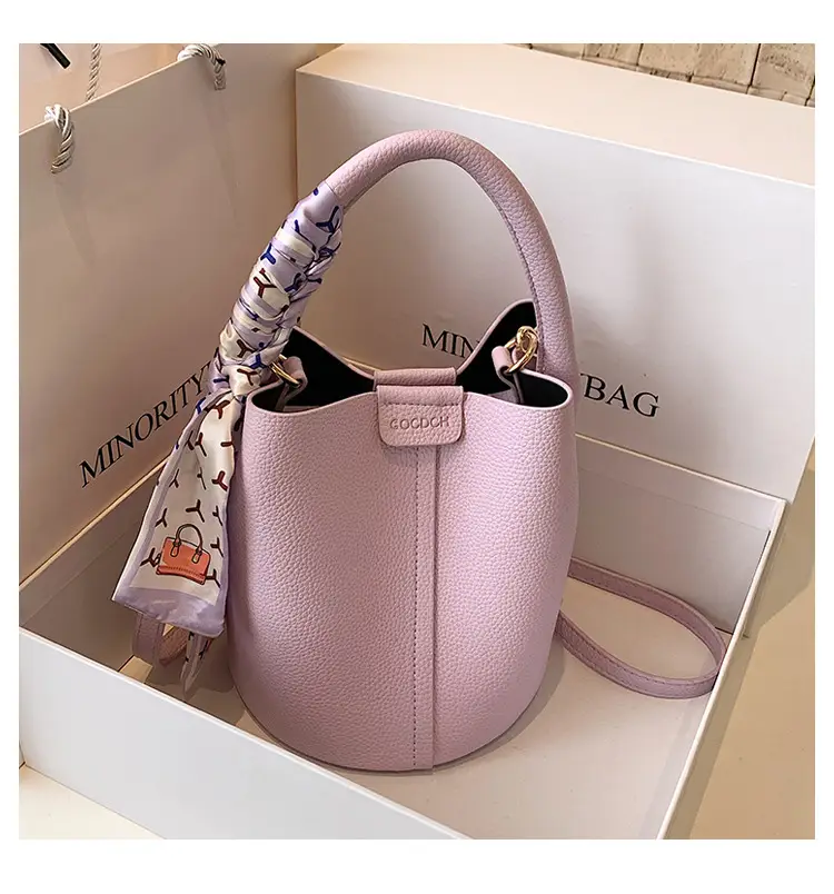 Pink Leather Crossbody Bag with Logo Work — feature 1