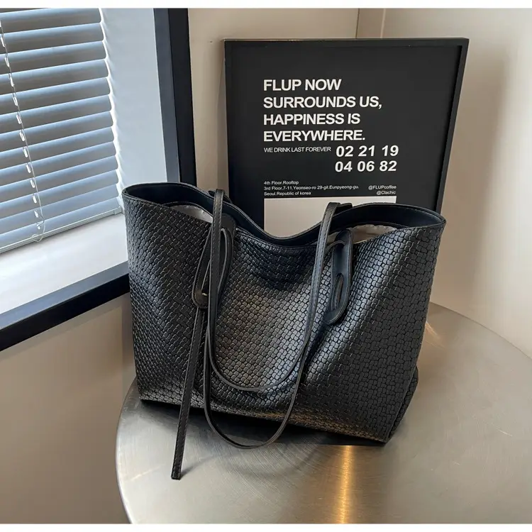 Black Crossbody Tote Bag with Embroidered Design — feature 16