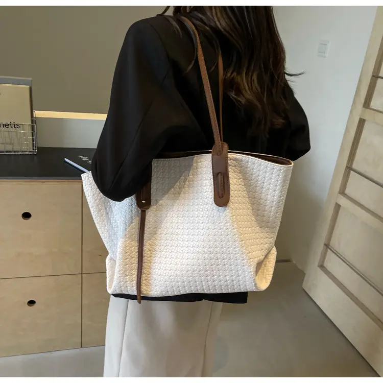 Black Crossbody Tote Bag with Embroidered Design — feature 20