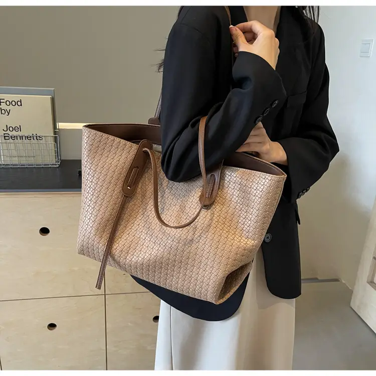 Black Crossbody Tote Bag with Embroidered Design — feature 22