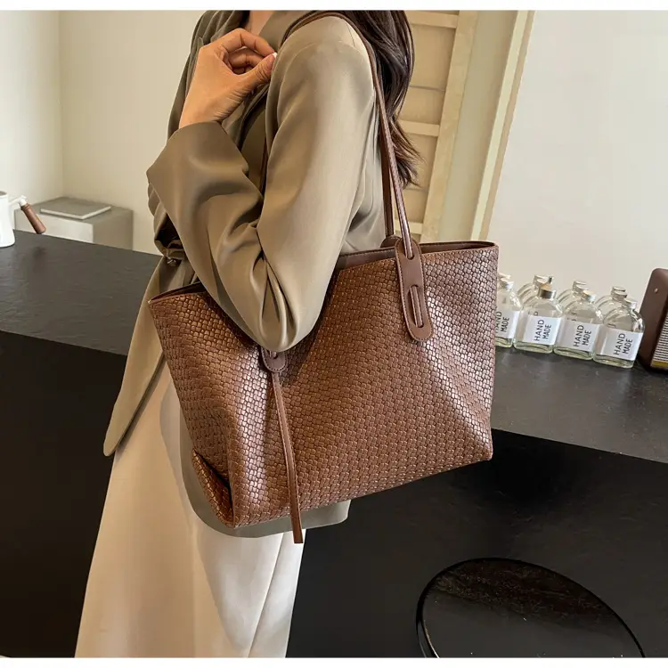 Black Crossbody Tote Bag with Embroidered Design — feature 24