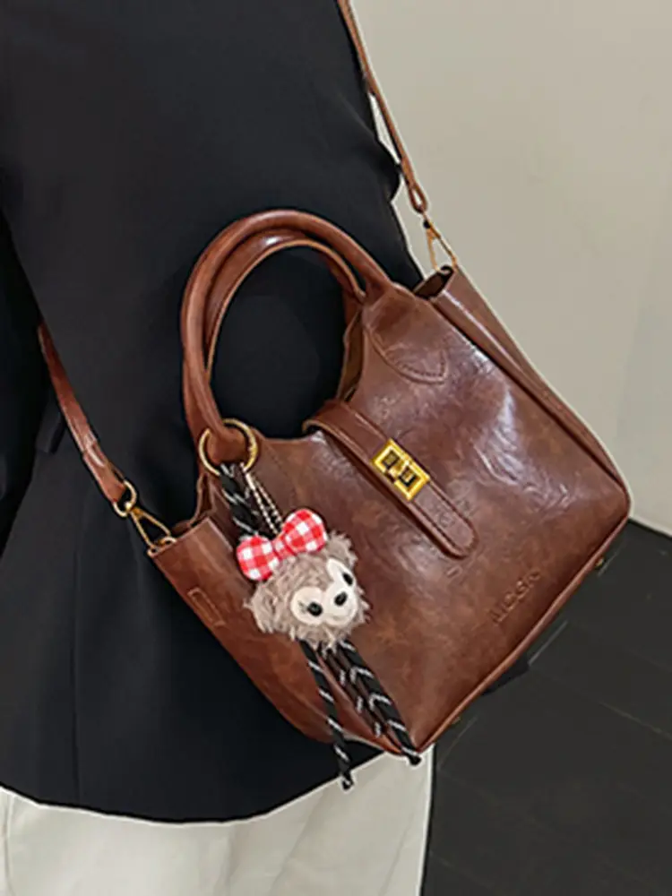 Women Pebbled Shoulder Crossbody Bag with Cute Charm - Image 11