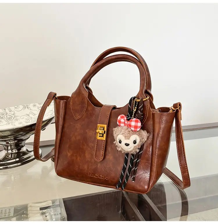 Women Pebbled Shoulder Crossbody Bag with Cute Charm — feature 13