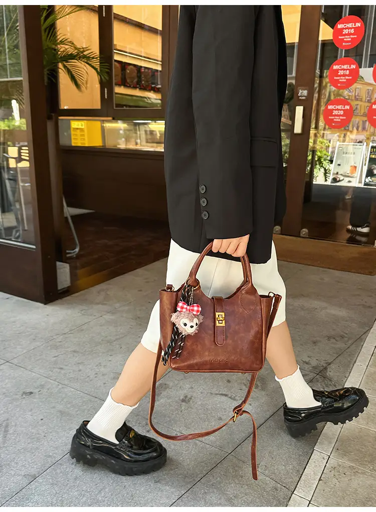 Women Pebbled Shoulder Crossbody Bag with Cute Charm — feature 16